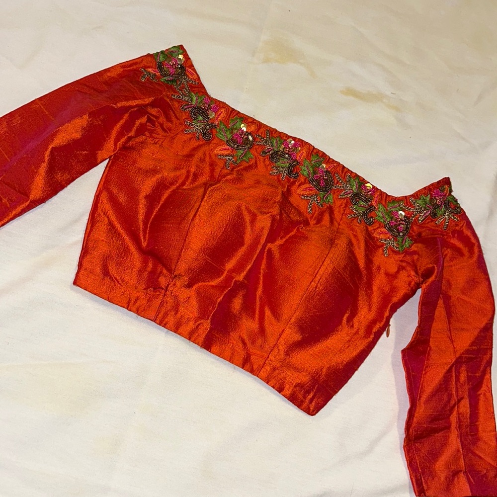 Orange silk off the shoulder top with hand work